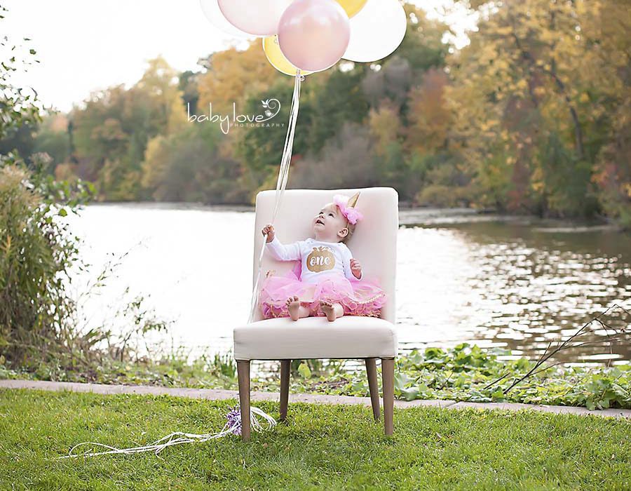 Birmingham Photographer captures one year old baby girl outdoors Michigan